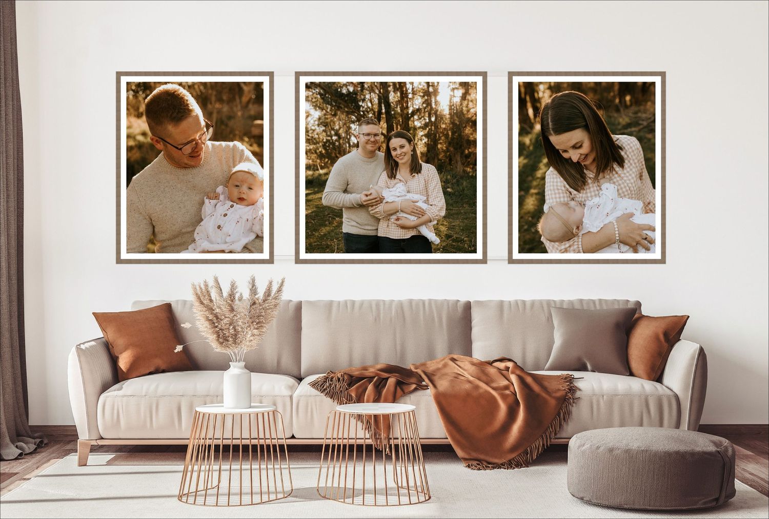 Gallery wall arrangement with family photos above modern sofa with terracotta pillows.