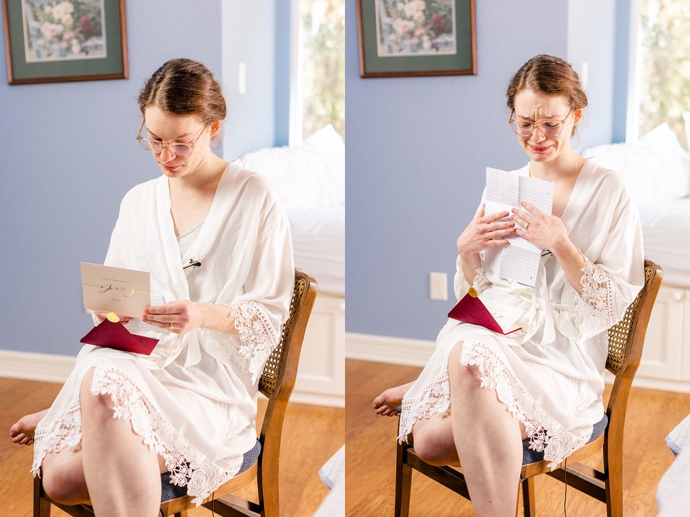 A person in a white lace robe reading cards while sitting in a wooden chair.
