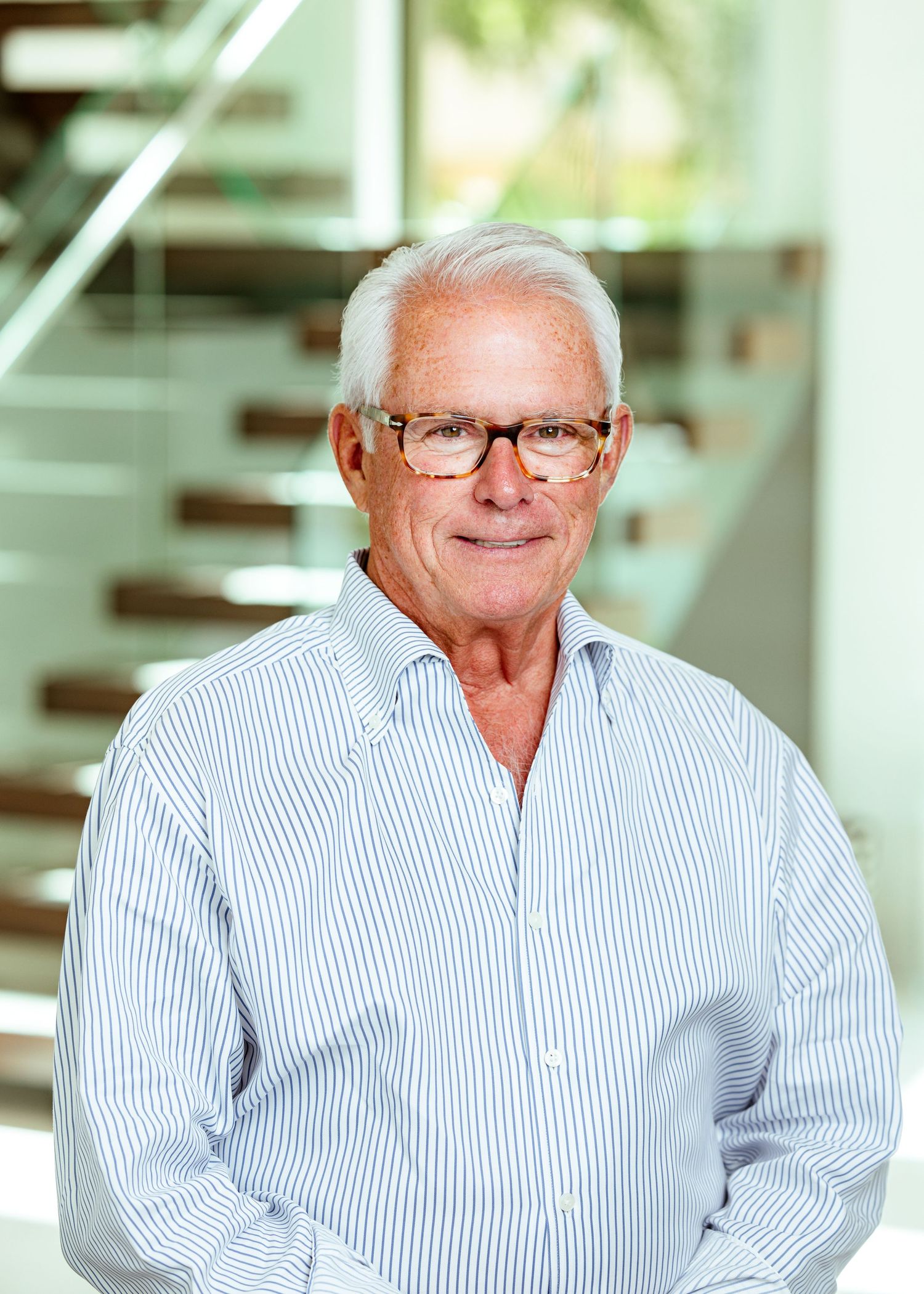 Real estate headshot of older gentleman in a million dollar home in Fort Lauderdale