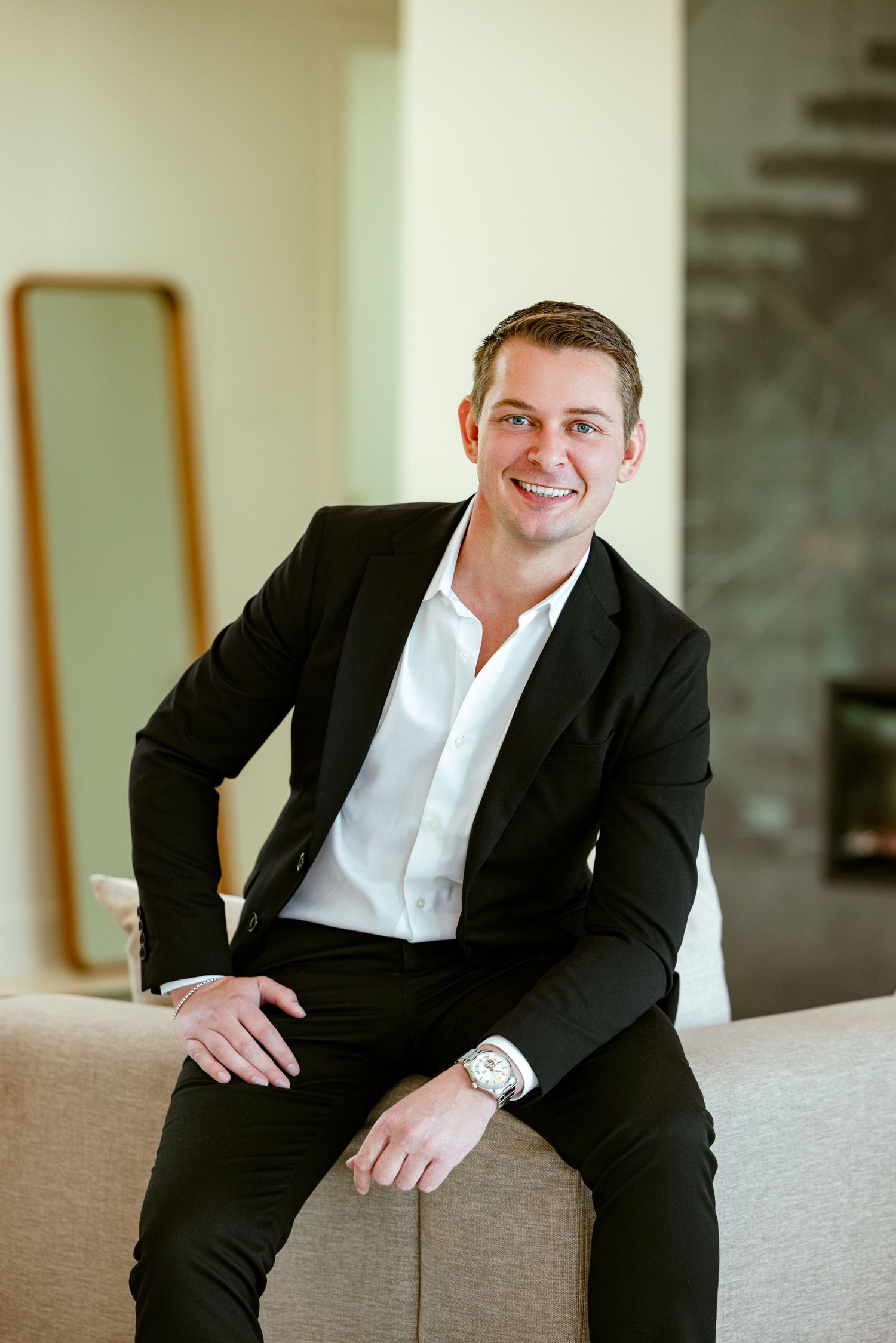 full body real estate portrait of male realtor in a luxury location in South Florida