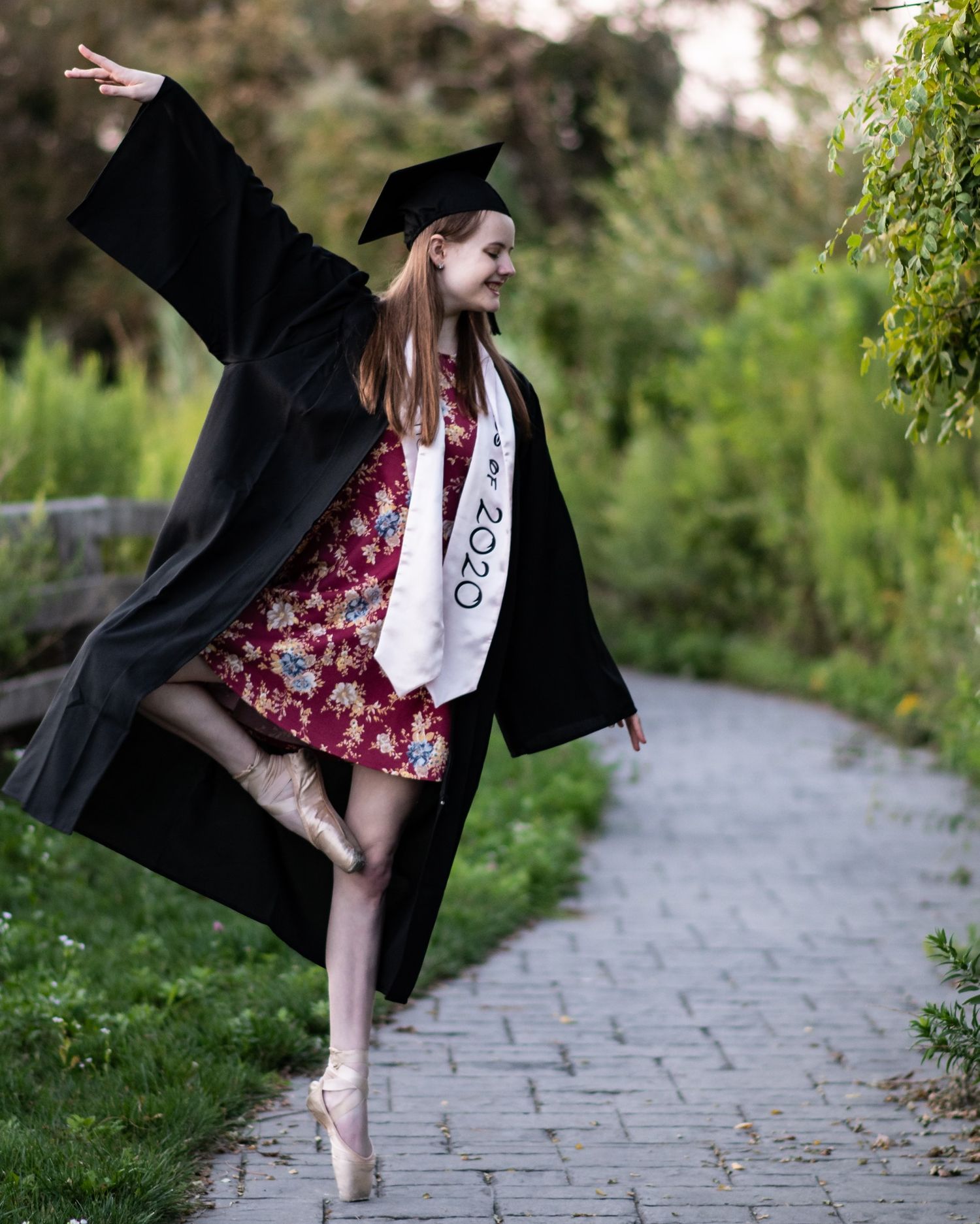 Senior portrait of graduating senior photographed on Long Island, Suffolk County. Environmental senior portrait at Swan Creek Perserve