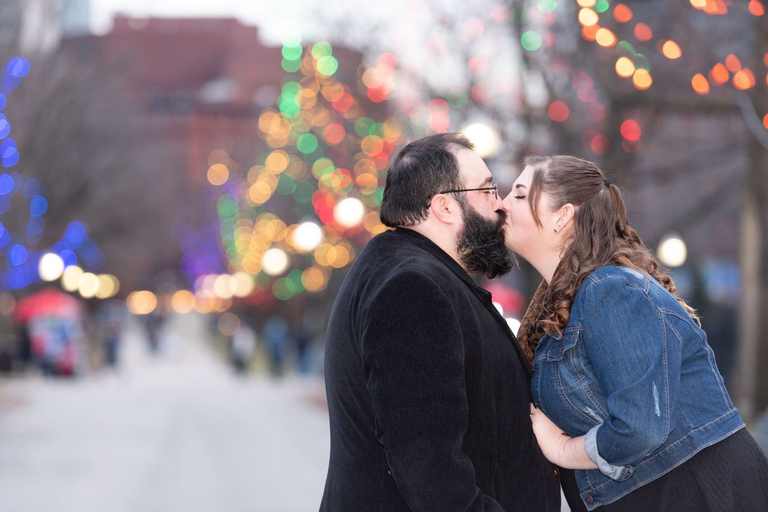 New Years Engagement Boston Common holiday lights couple kiss in love Leah Ramuglia photography