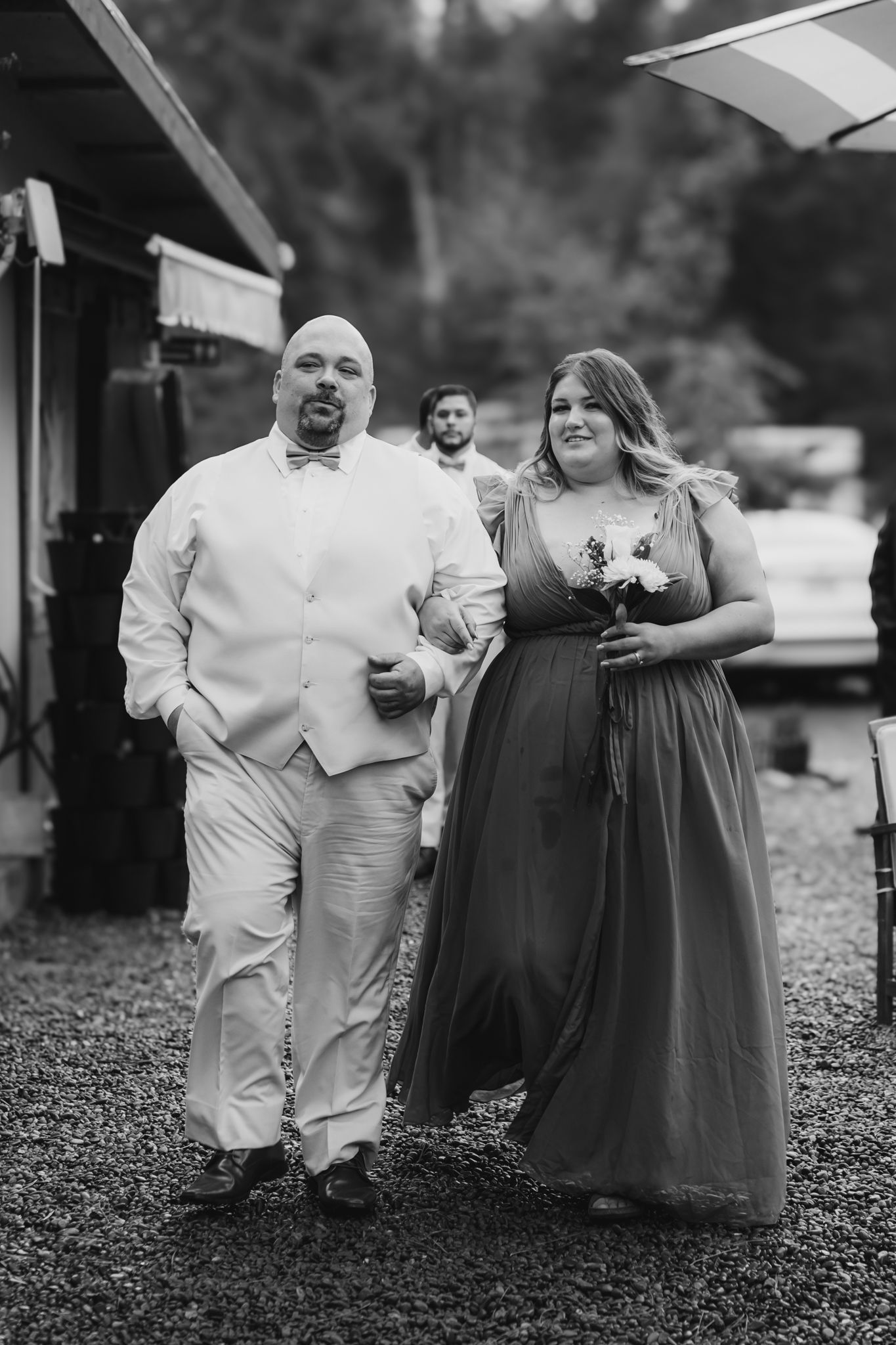 groomsman and bridesmaid enter