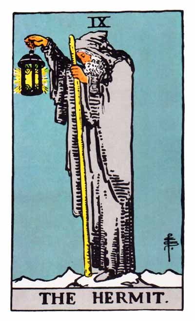 A tarot card depicting The Hermit holding a lantern and staff against a blue background.