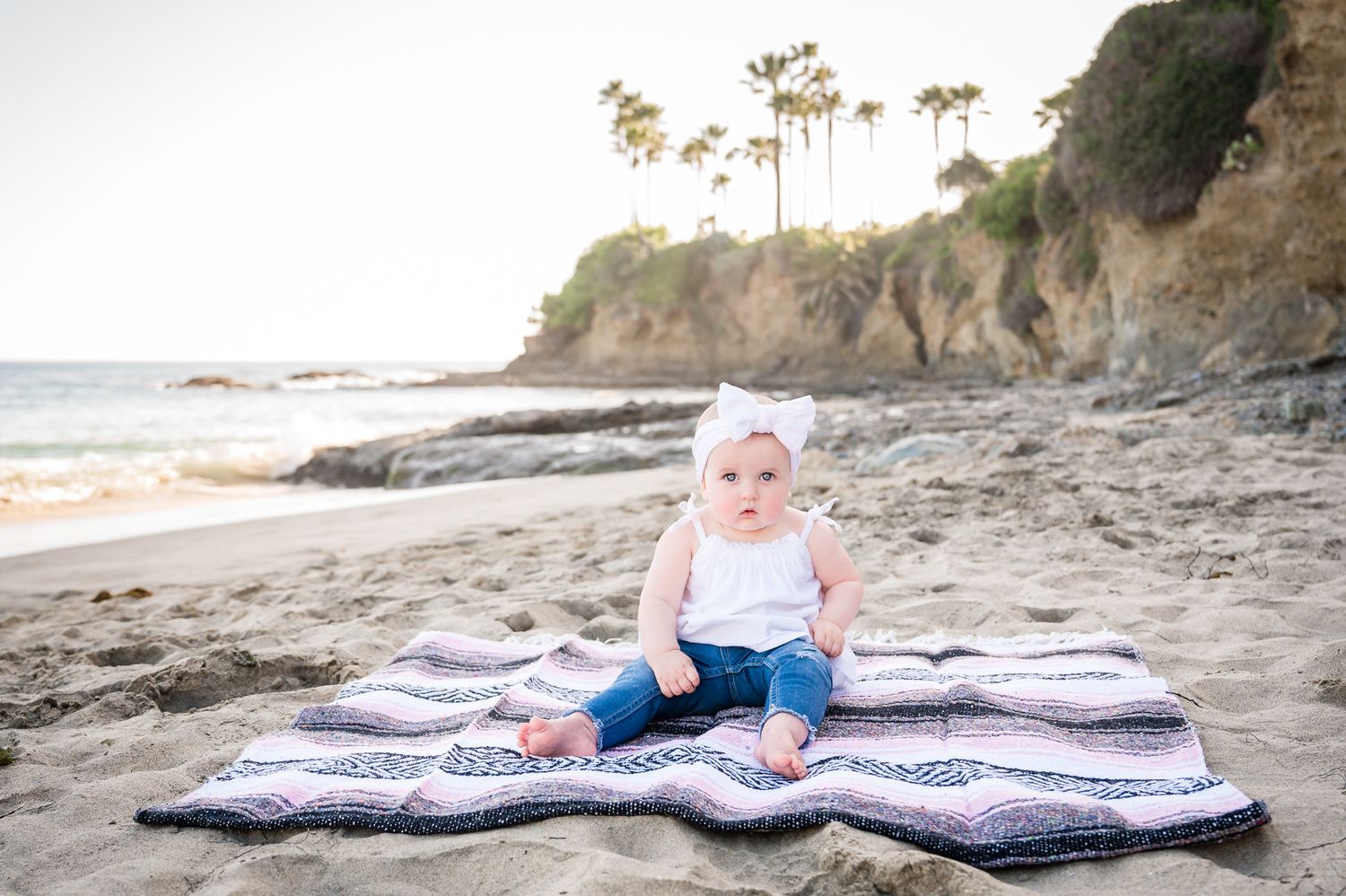 Image of a one year old girl on the beach in Laguna Beach, CA