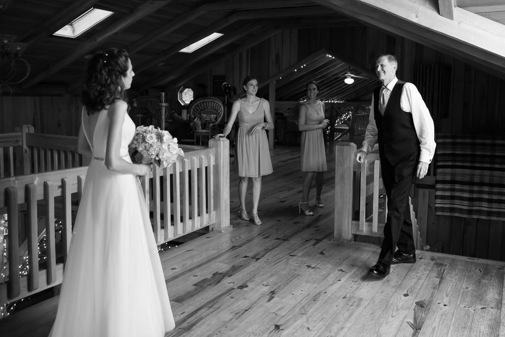 Fathers sees daughter on her wedding day at Crystal Brook Farm in Chagrin Falls, Ohio.