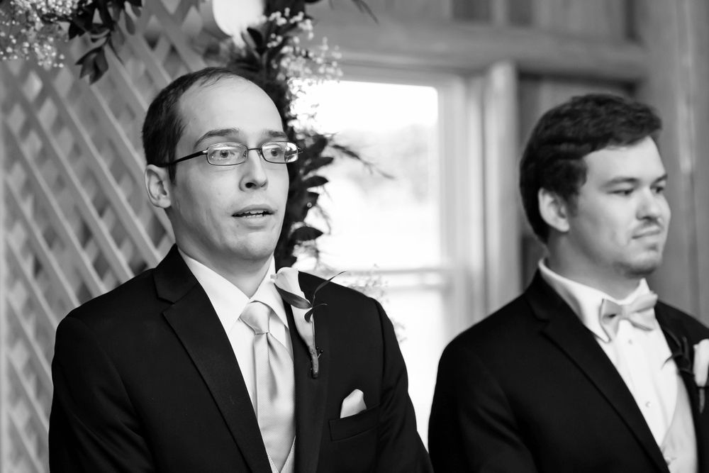 Grooms sees bride during wedding ceremony at Crystal Brook Farm in Chagrin Falls, Ohio.
