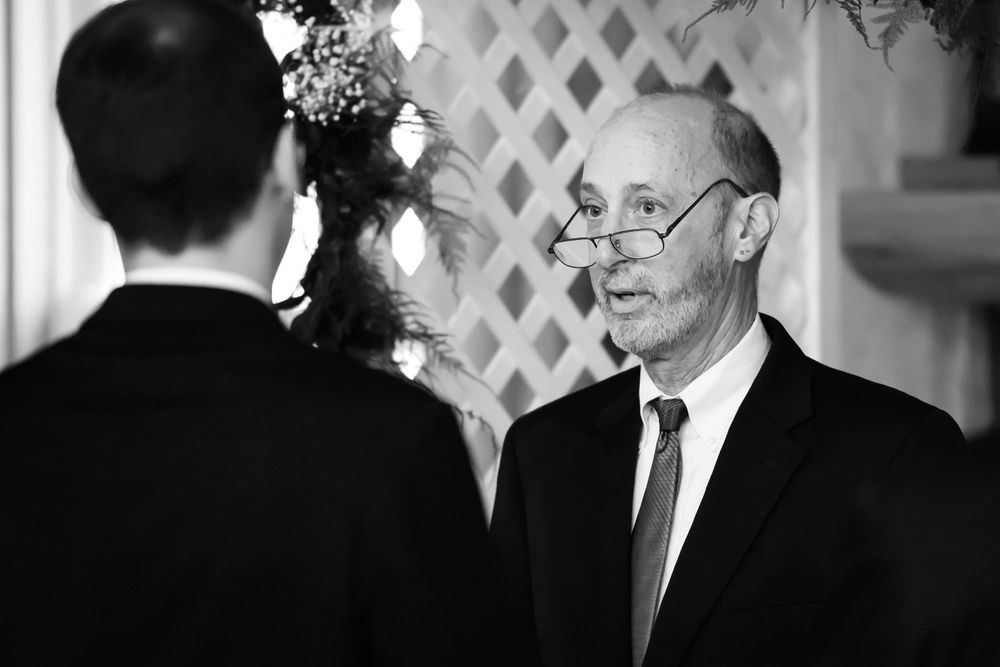 Officiant during wedding ceremony at Crystal Brook Farm in Chagrin Falls, Ohio.