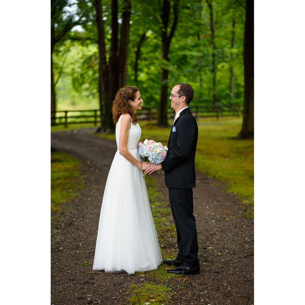 Bride and groom outside after wedding ceremony at Crystal Brook Farm in Chagrin Falls, Ohio.