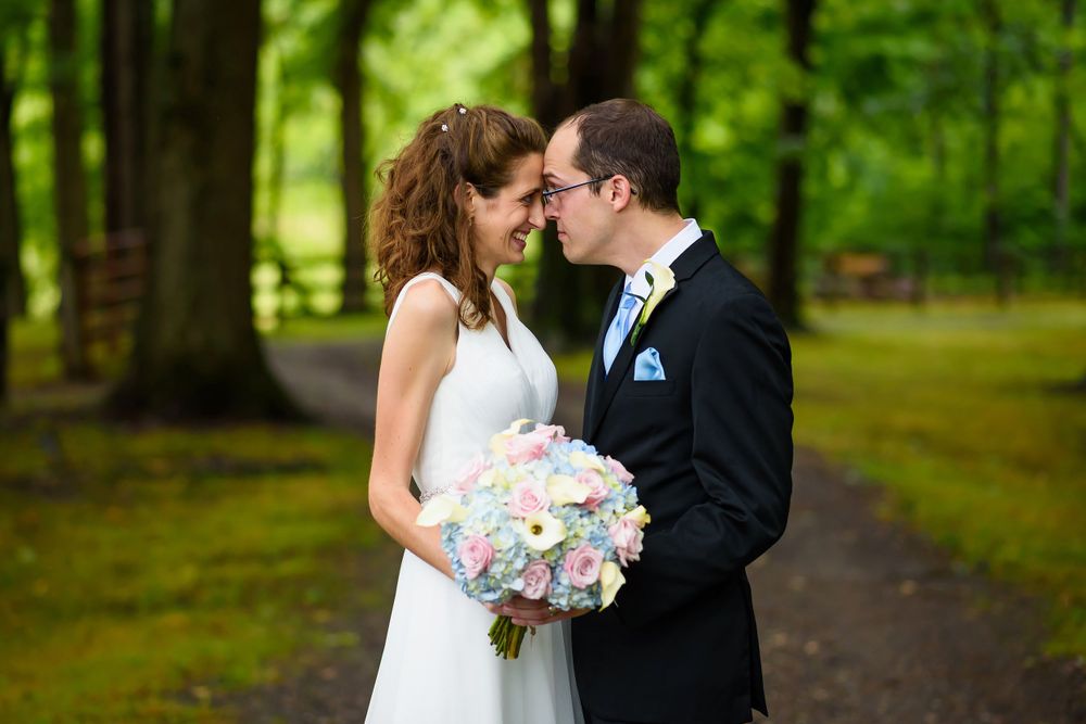 Bride and groom nose to nose at Crystal Brook Farm in Chagrin Falls, Ohio.
