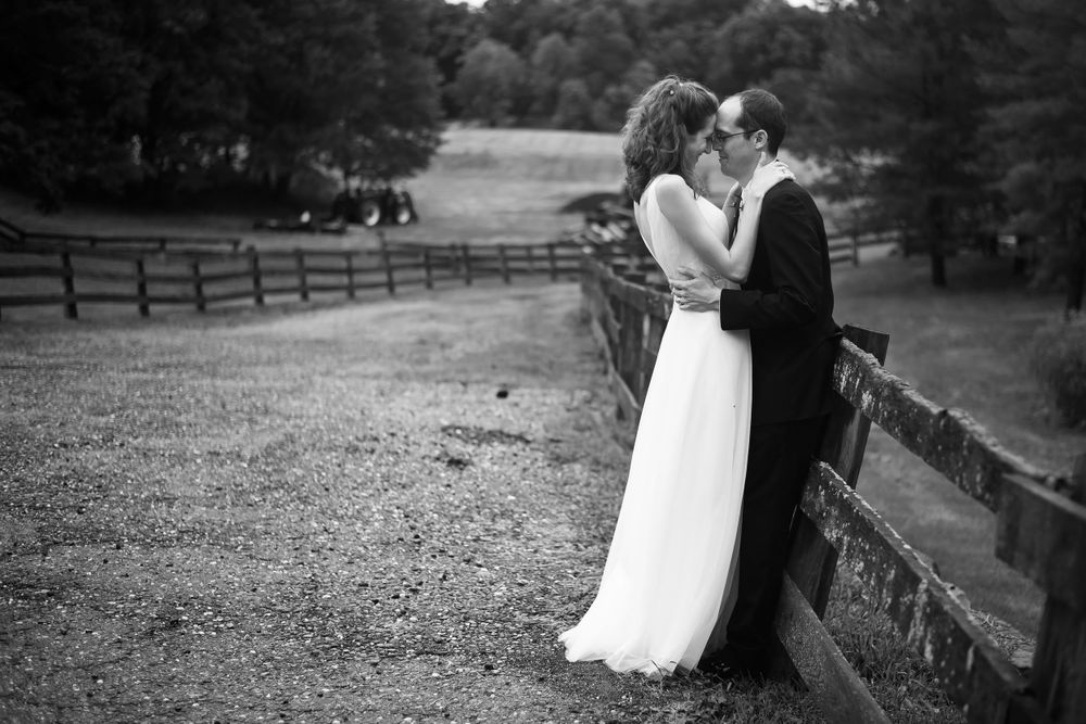 Bride and groom embracing at Crystal Brook Farm in Chagrin Falls, Ohio.