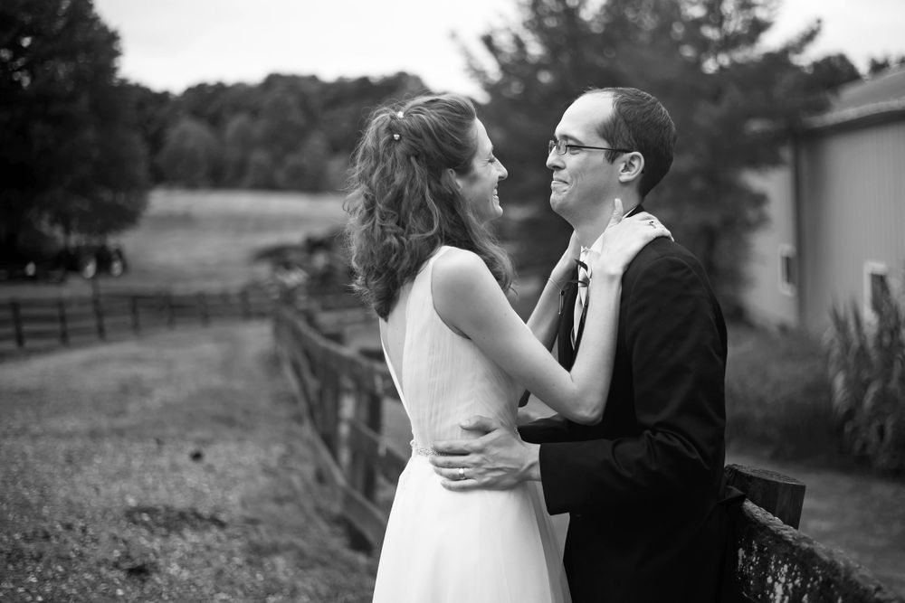 Bride loving on groom at Crystal Brook Farm in Chagrin Falls, Ohio.