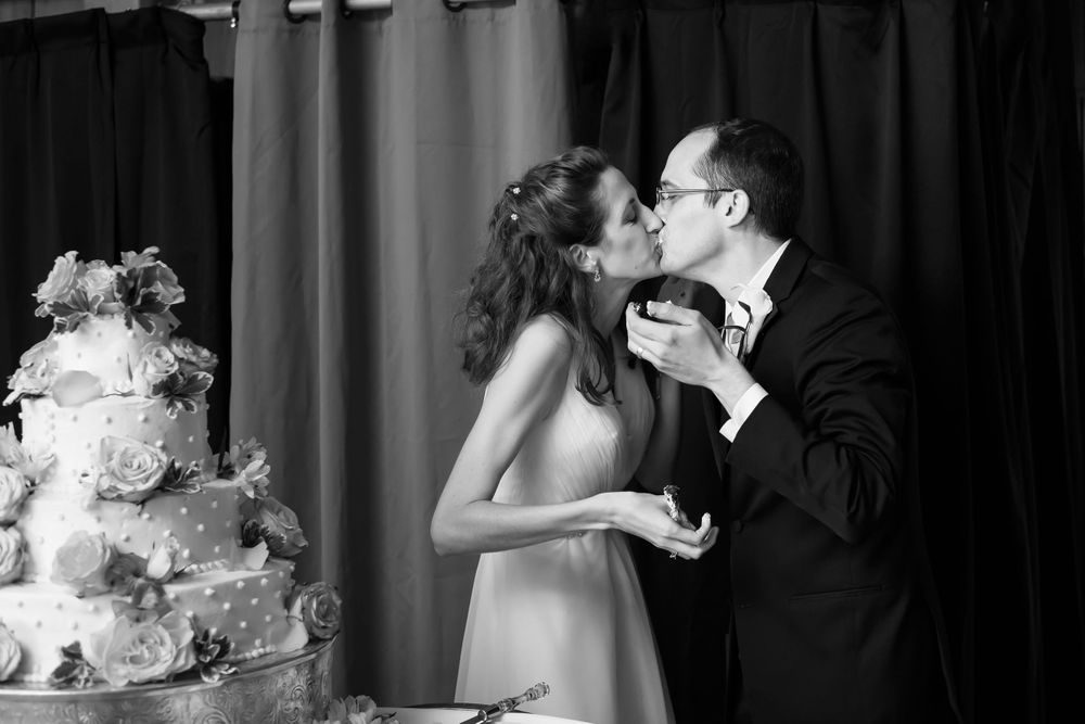 Cut the cake during wedding reception at Crystal Brook Farm in Chagrin Falls, Ohio.