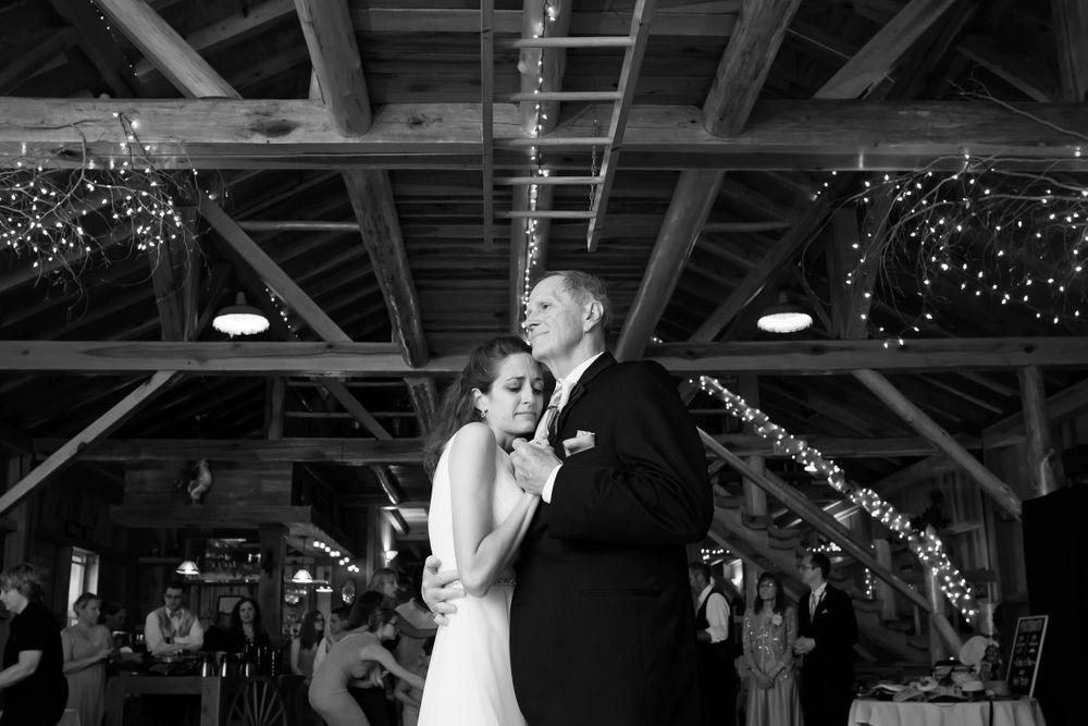 Father and daughter dance during wedding reception at Crystal Brook Farm in Chagrin Falls, Ohio.