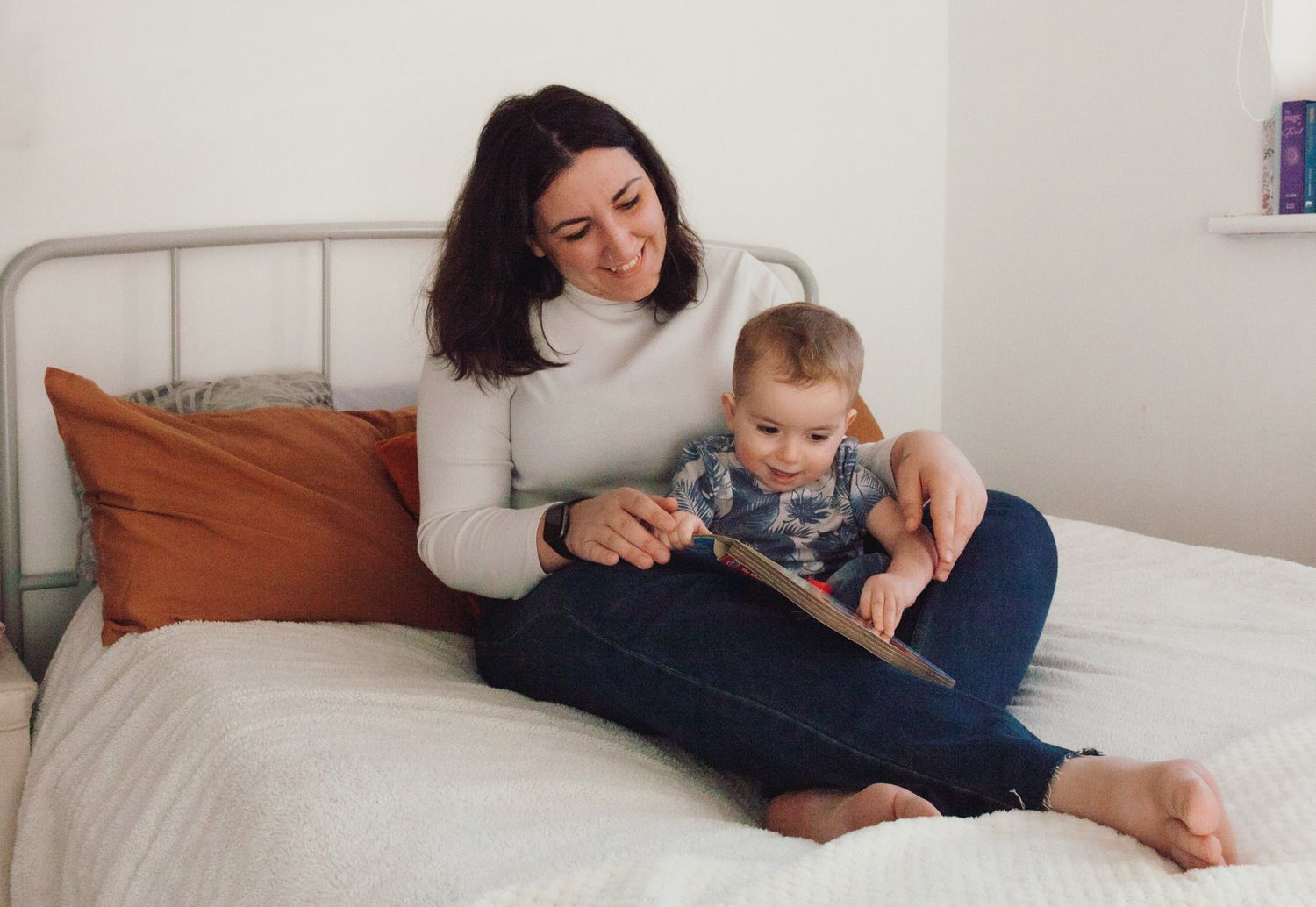 lifestyle photo showing mother and son reading a book together, photographed by Maria Photography, a family photographer
