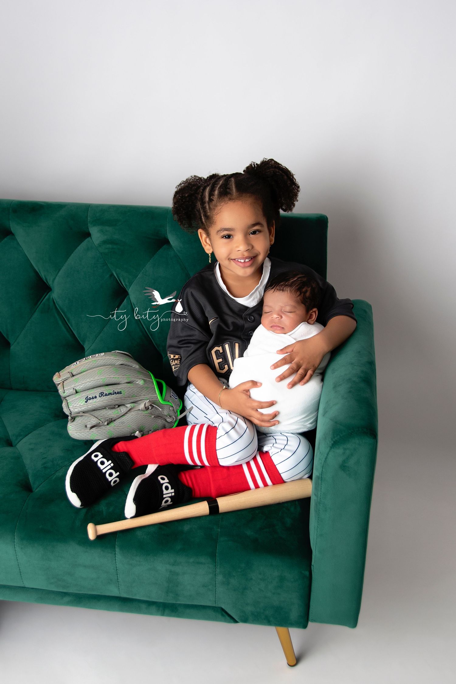 Sister Isabella with baby brother Jose Ramirez Cleveland Guardians Newborn Photography