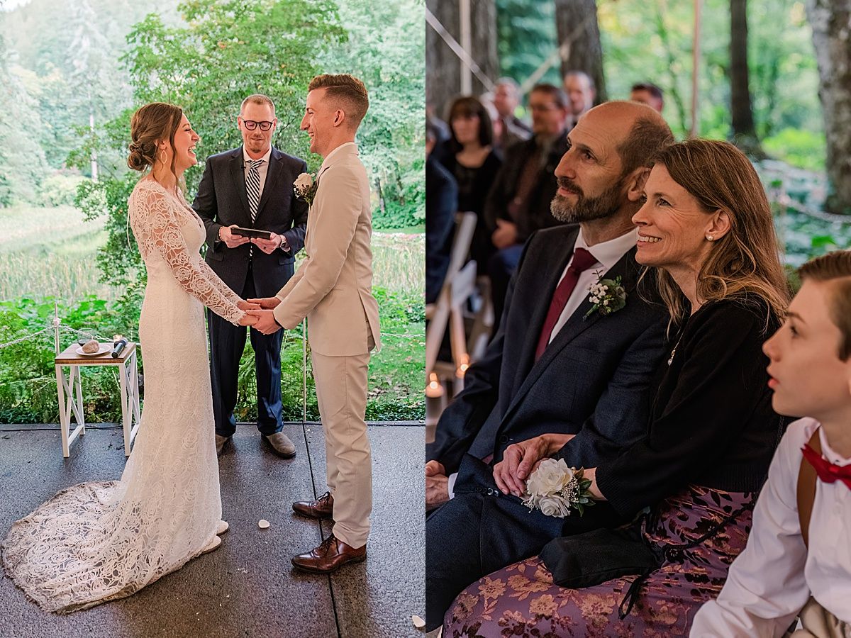 Bride and groom smiling at each other and family smiling during wedding ceremony