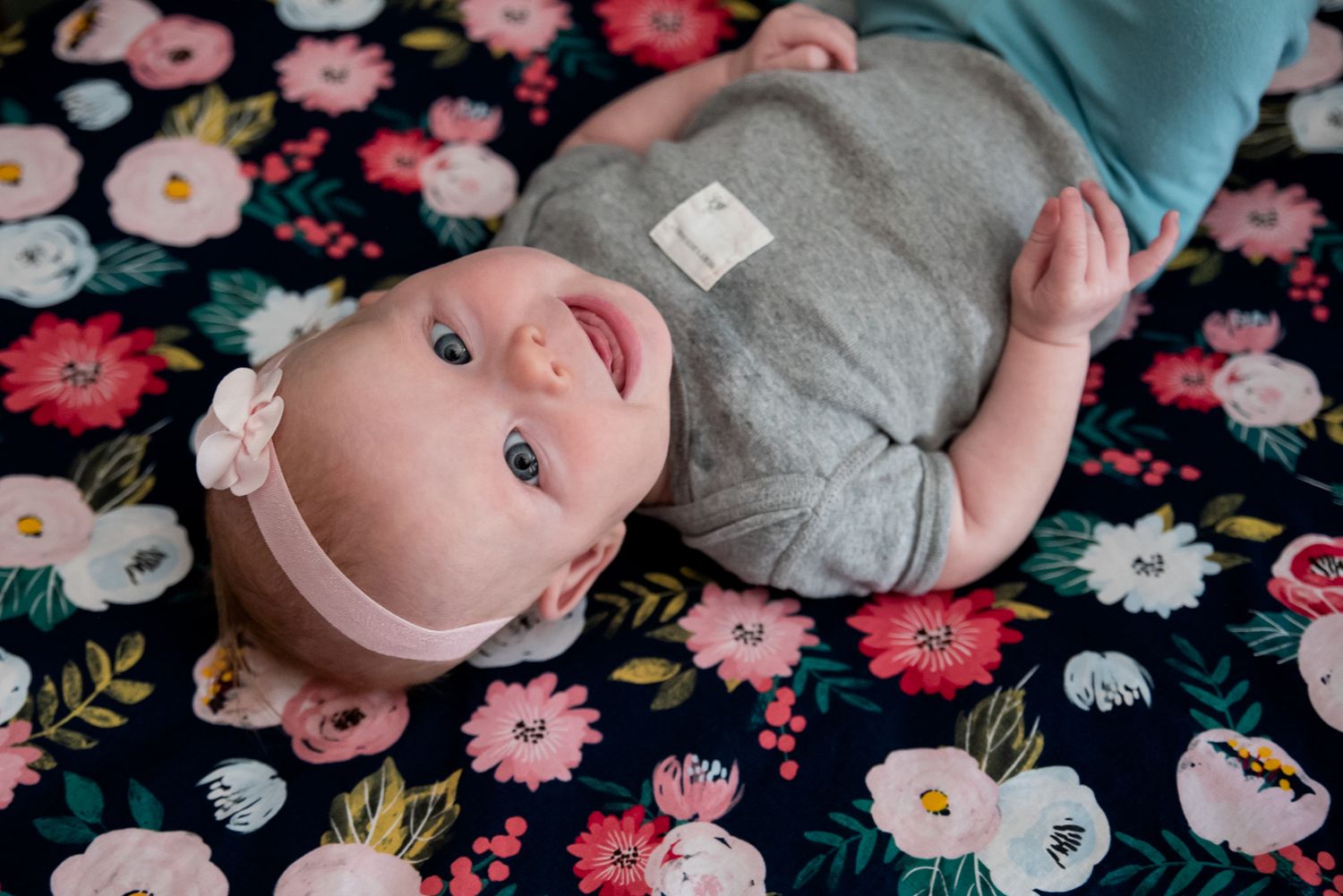 Three month old baby girl portraits. Florals and babies. Happy baby girl. Lindsey Stoebner Photography Dayton Ohio.