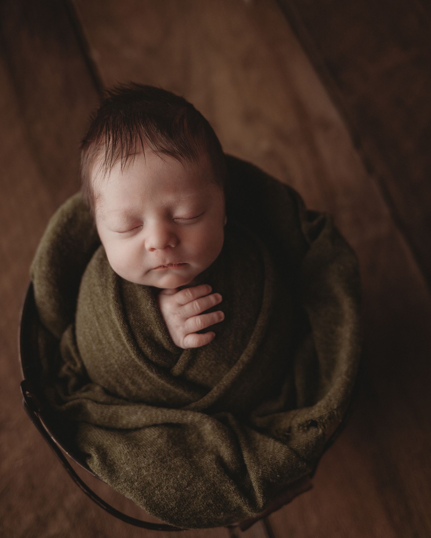 newborn baby mossy green swaddle