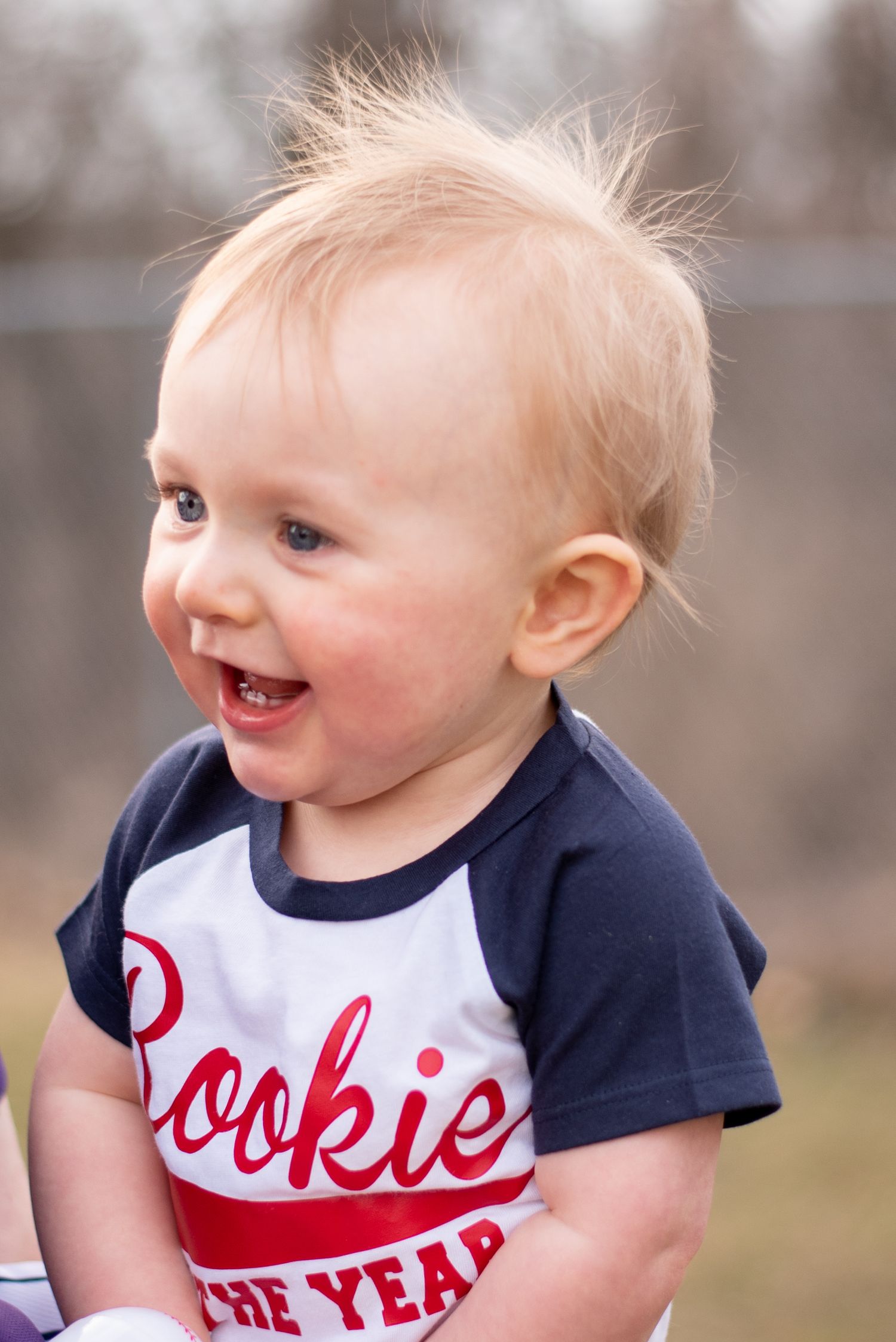 first birthday boy with baseball theme