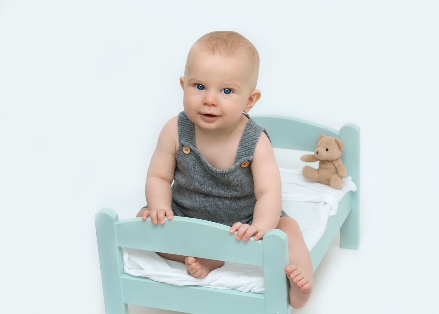 Baby Boy Sitting Unaided Bed. Newborn Photographer Tameside