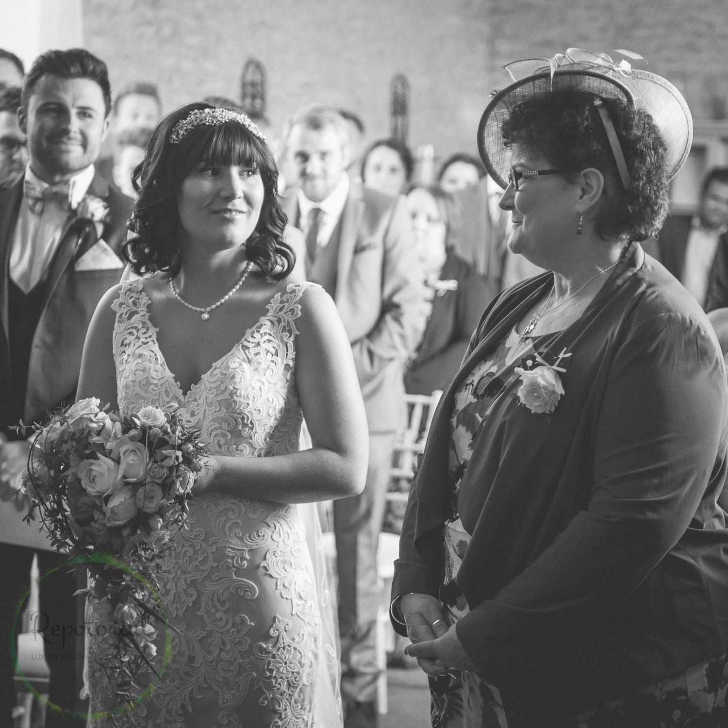bride and brides mother at front of ceremony