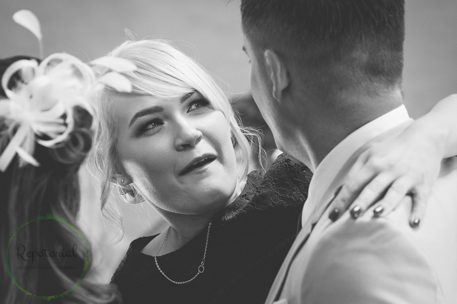 reportage candid of guests talking and embracing