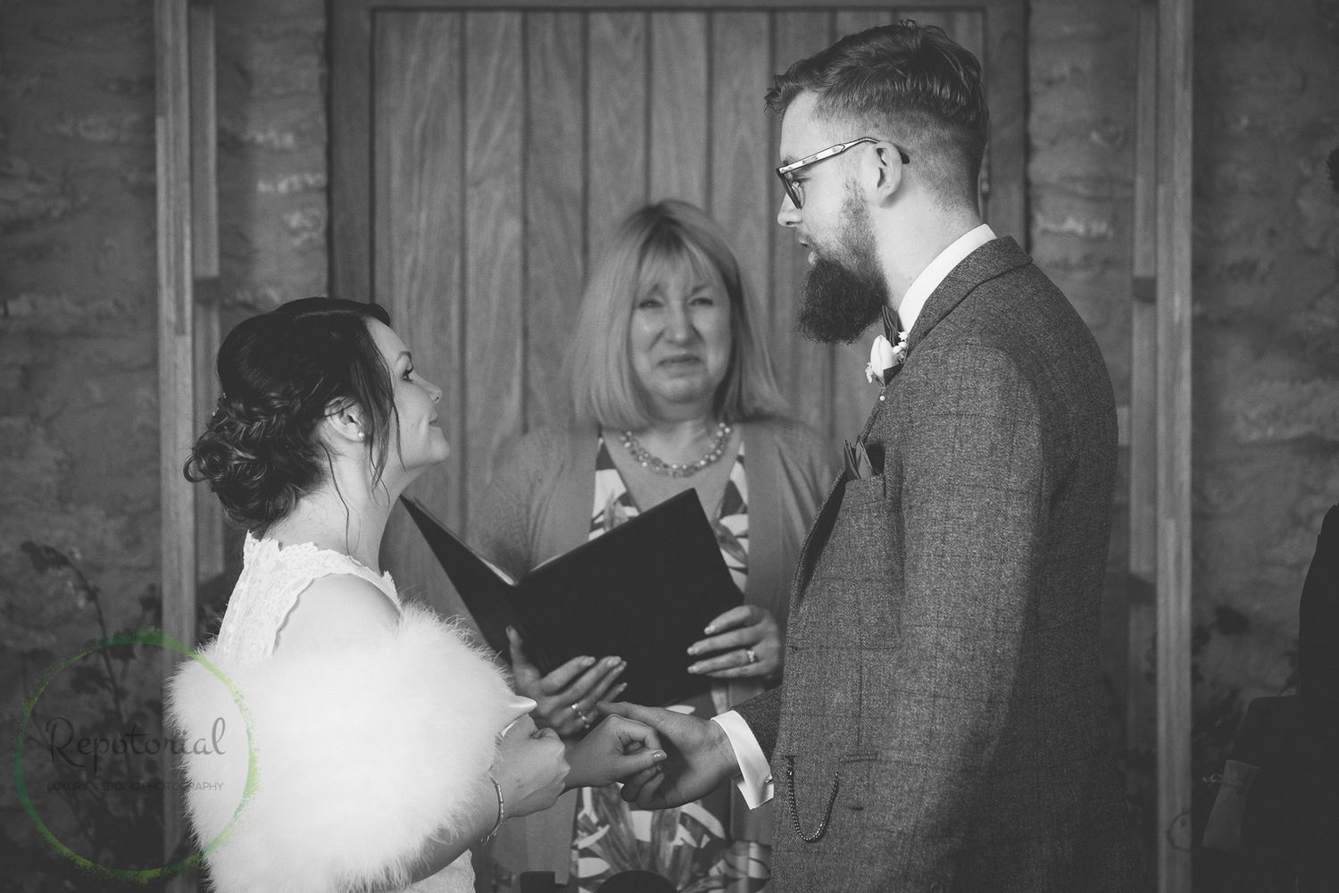 bride and bride groom saying wedding vows and "I do" during wedding ceremony. Monochrome photo