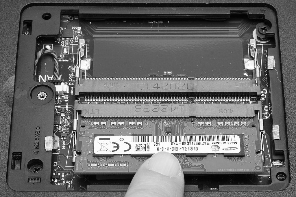 Inserting a typical Laptop memory module (B+W)
