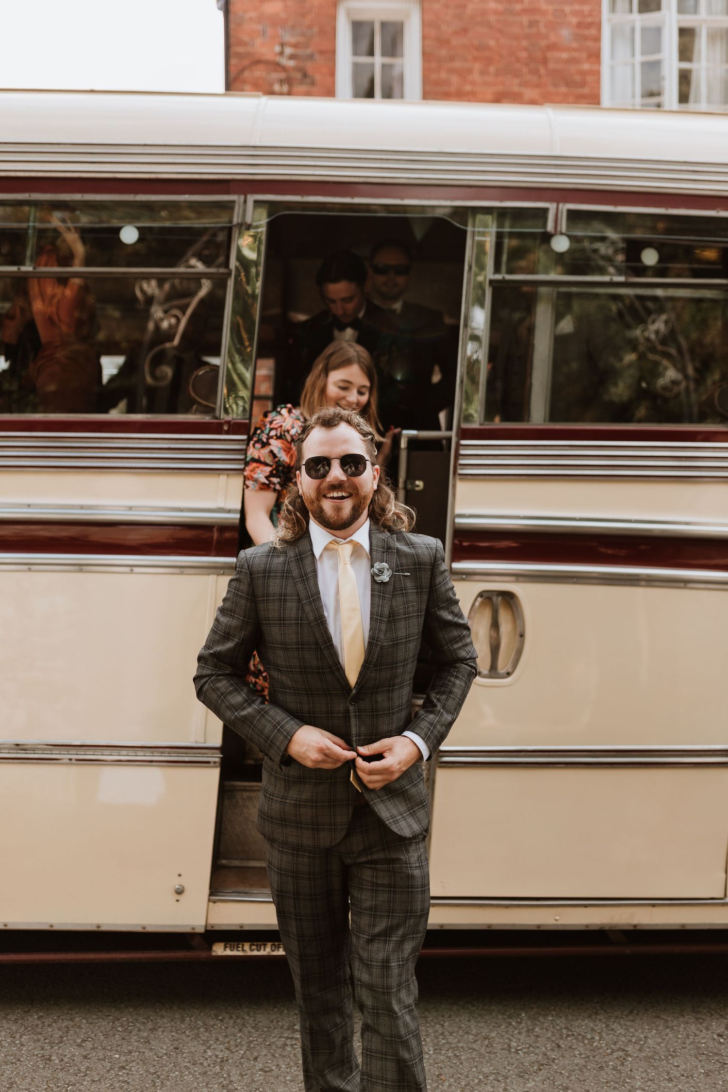 Guests arriving on vintage 60s bus to montgomery church
