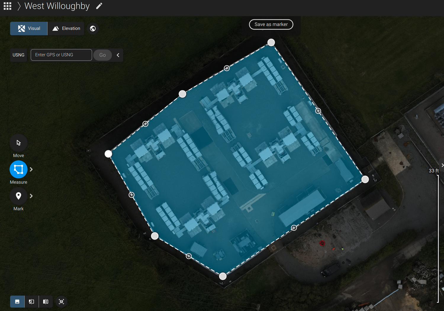Aerial map view with blue overlay showing building footprint measurements and dimensions.