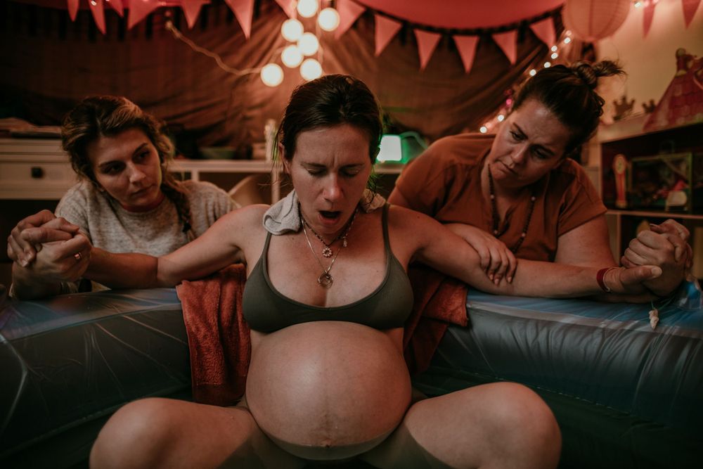 midwife and doula support single mother during home birth portland oregon birth photographer