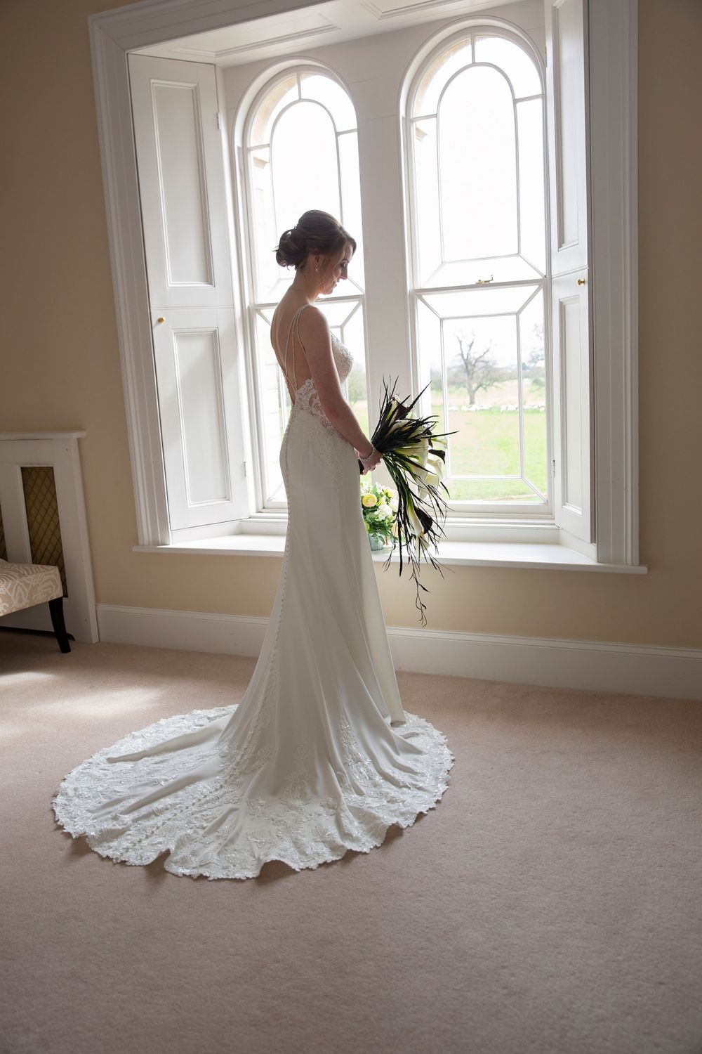 Bride and her bouquet at St Tewdrics House Chepstow