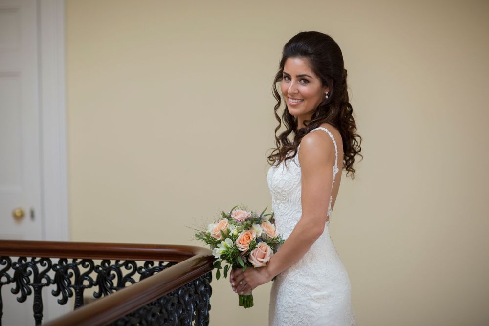 Bride top of stairs at St Tewdrics House