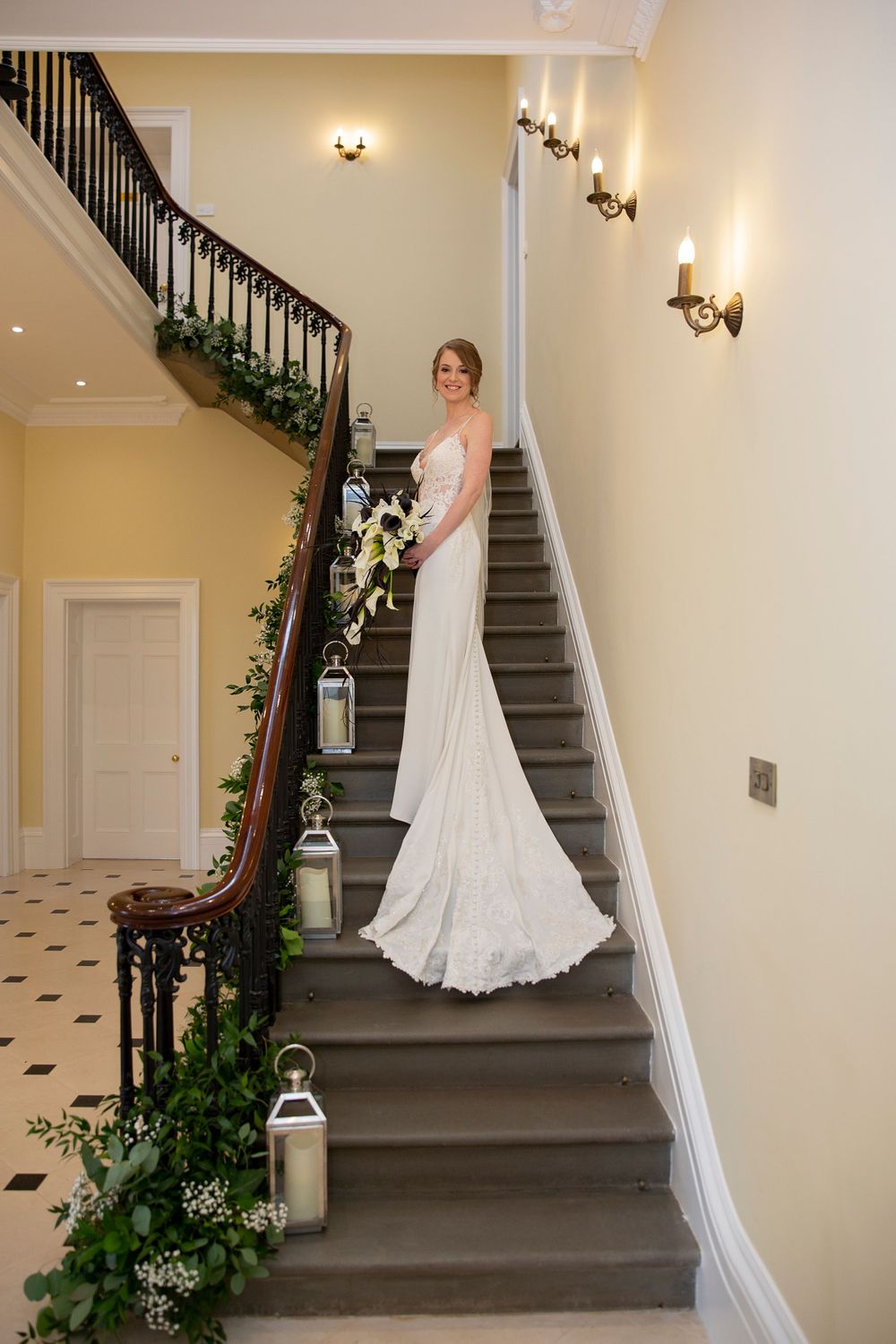 great staircase wedding photo of bride at St Tewdrics House Chepstow