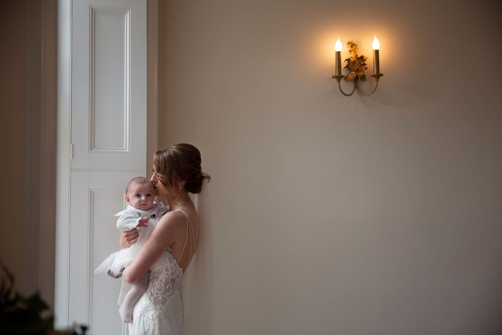 Bride and her baby girl at St Tewdrics House