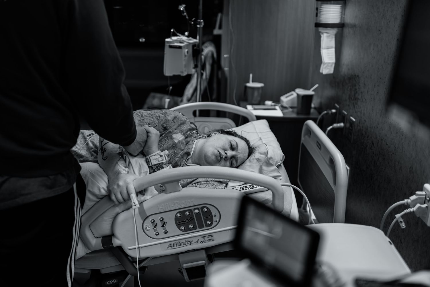 Medical monitoring equipment and devices surrounding a hospital bed.
