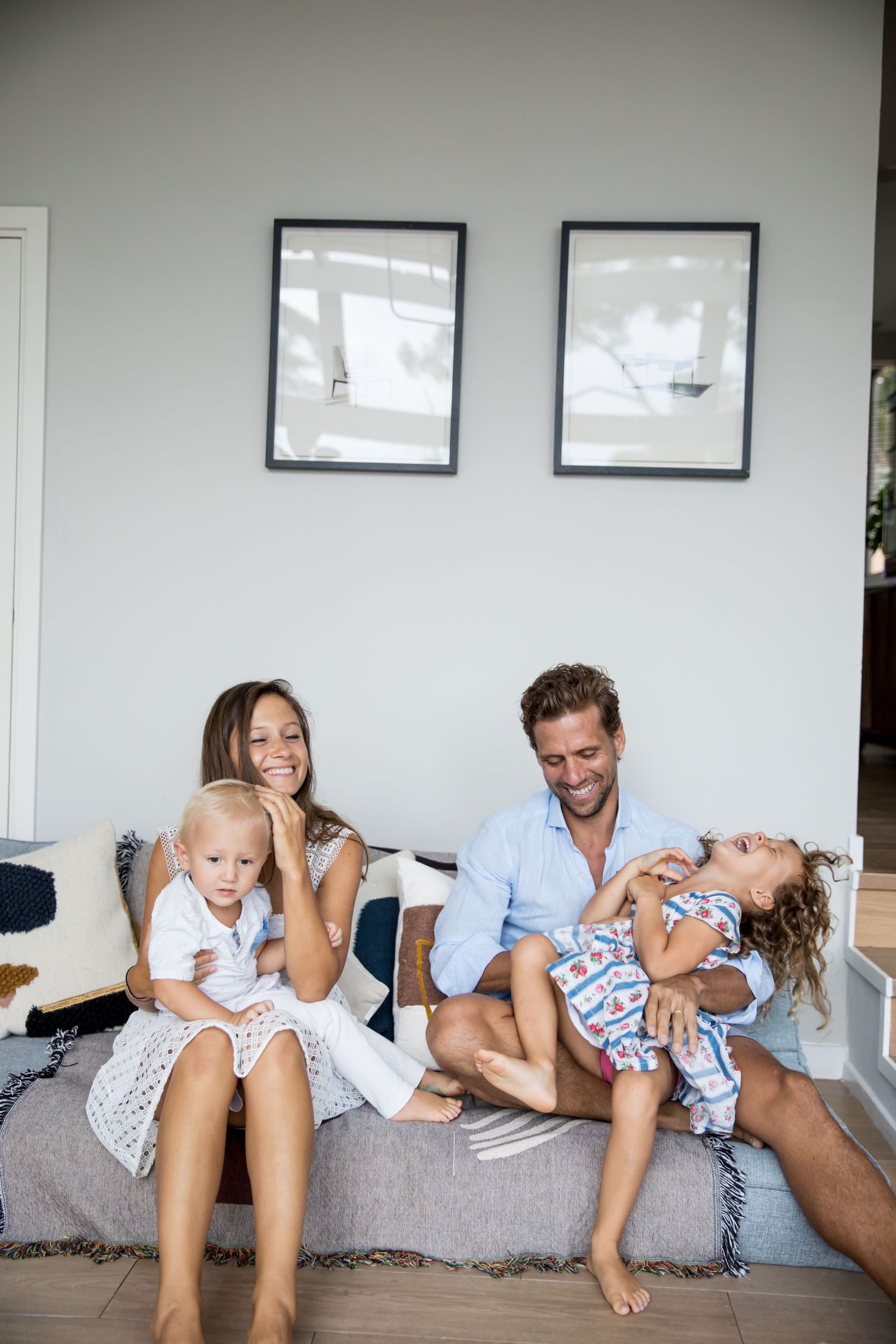 Family tickle fight on the couch