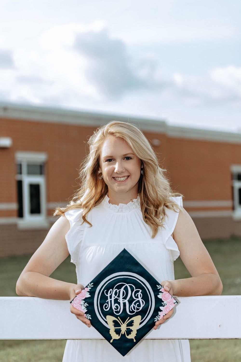 Haleigh Rhodes, senior photography session including cap and gown.