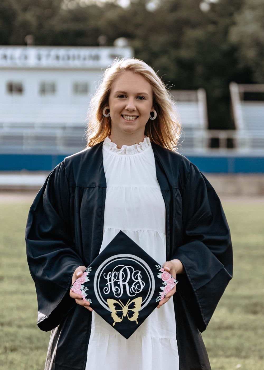 Haleigh Rhodes, senior photography session including cap and gown.