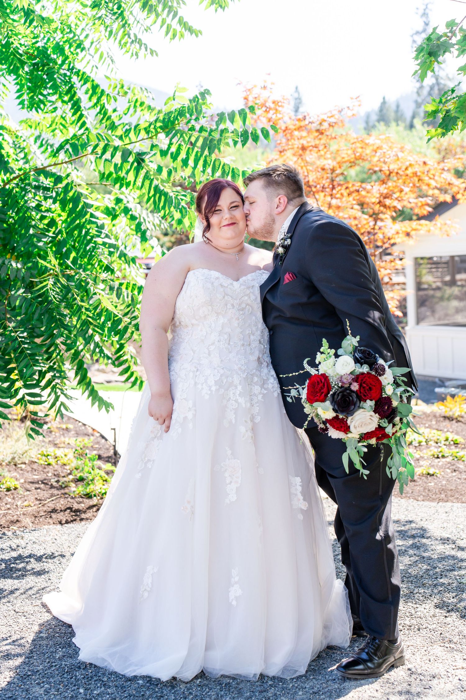 groom kisses bride