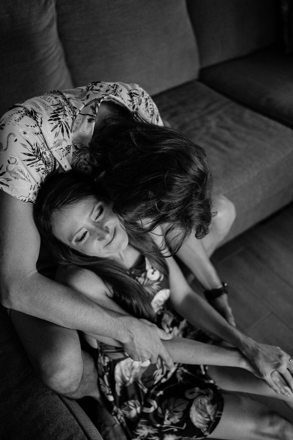 An intimate black and white portrait session capturing genuine emotion.