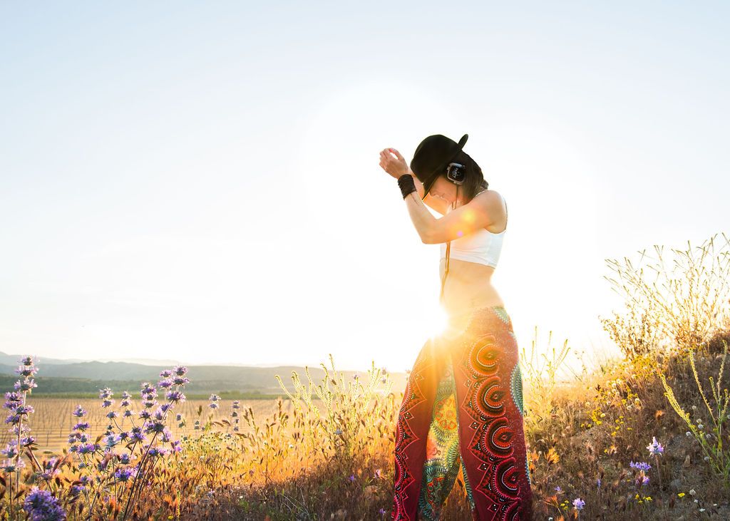 woman dancing in silent disco in nature