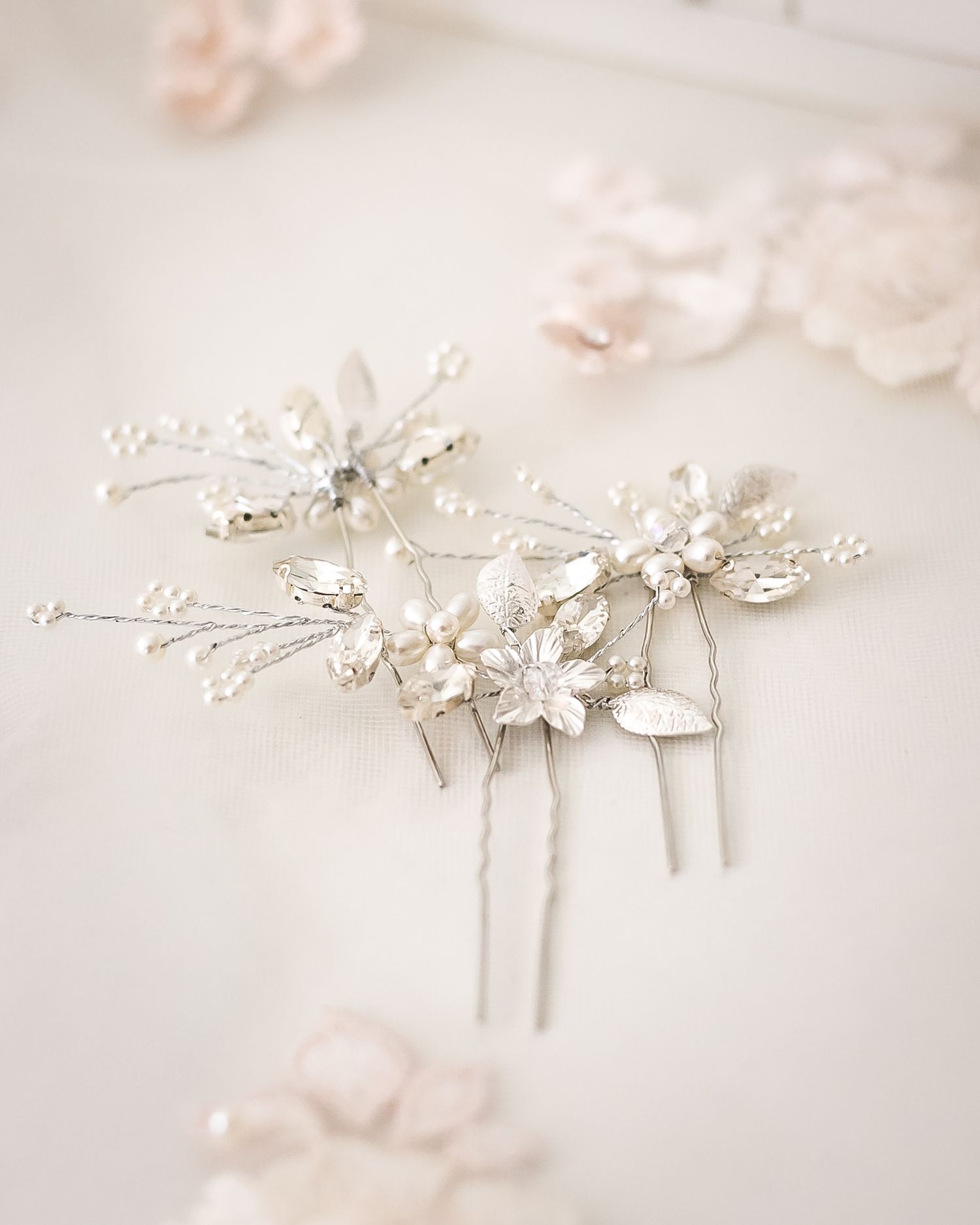 A bride's wedding hair pieces displayed on her veil. Photo by Kari Mills Photographer, Vancouver wedding photographer.