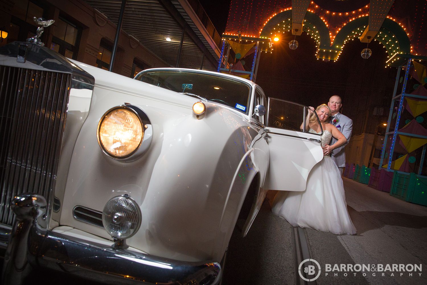 Wedding reception venue at night decorated with romantic string lights and elegant details.