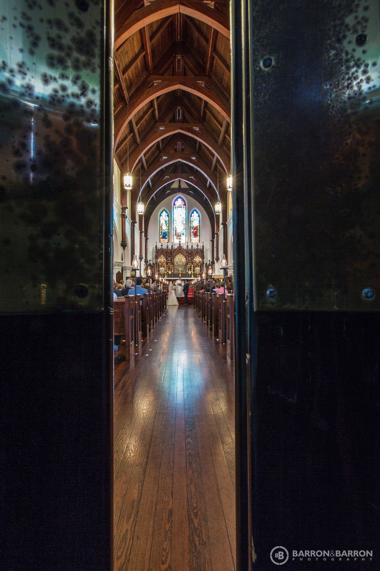 Gothic church interior with wooden floors and stained glass windows captured in progressive frames.