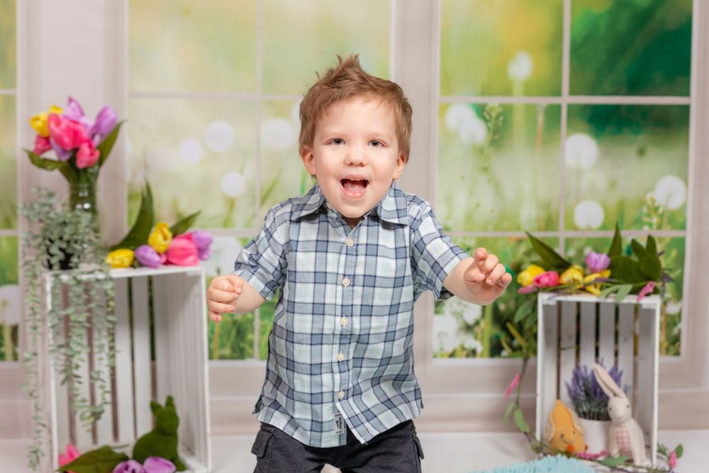 child jumping with excitement during spring mini in studio in clayton new jersey Gloucester county