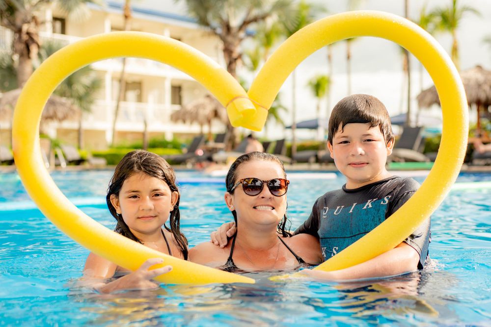 Family Photo Shoot in MargaritaVille Flamingo Beach