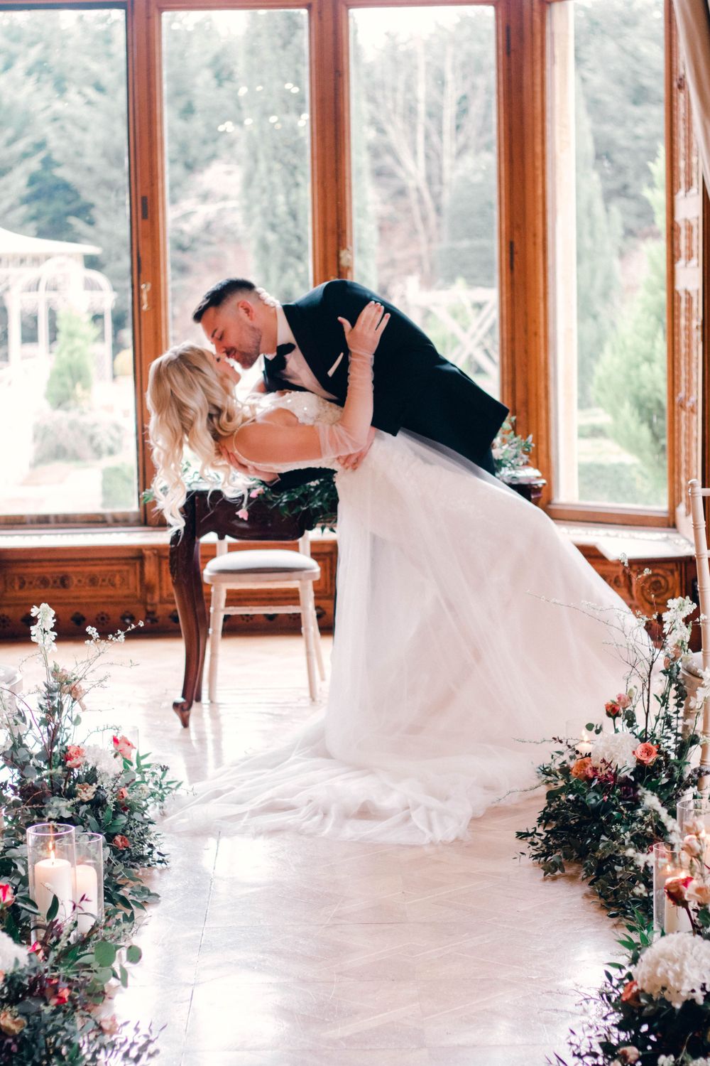 Mr & Mrs first kiss Manor by the lake fine art luxury wedding photographer