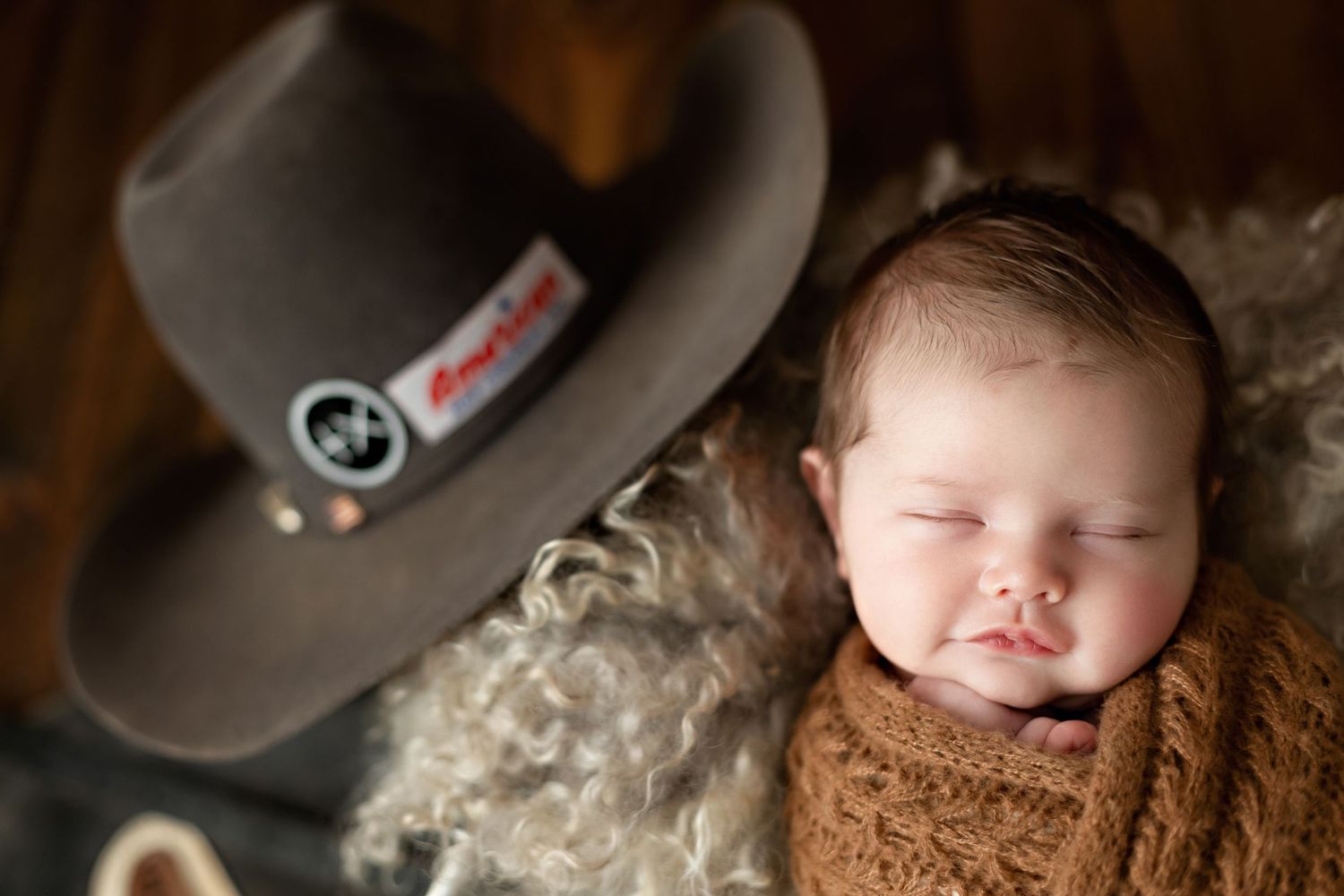 A newborn session with a cowboy hat. Greenville SC newborn photographer, Easley, SC newborn photographer, Upstate SC newborn
